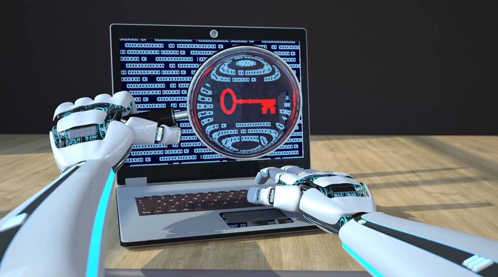 Un brazo robótico interactuando con un portátil que muestra código en la pantalla. Una lupa digital sobre la pantalla destaca una llave, simbolizando el acceso a sistemas informáticos.