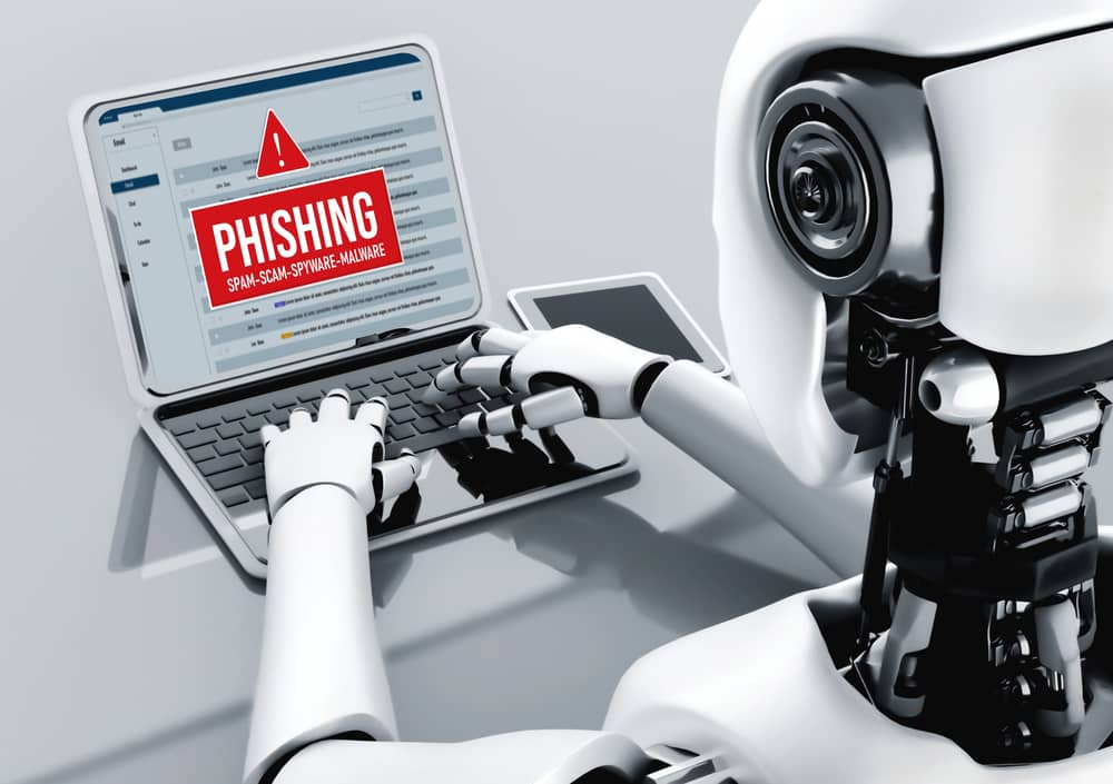 Phishing con Inteligencia Artificial: Cómo están cambiando las Ciberamenazas 20 Robot ejecutando un ataque de phishing con IA, mostrando un correo electrónico fraudulento en su laptop. Alto riesgo de spam, scam, spyware y malware.